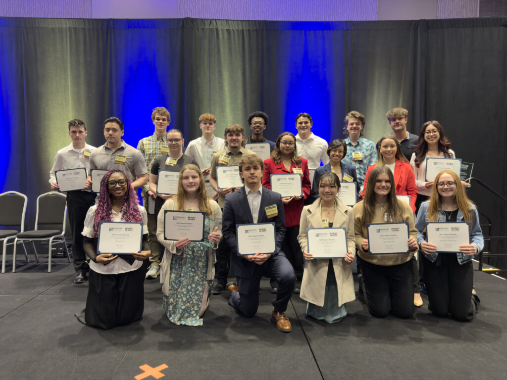 Group of Work-Based Learners Holding Certificates